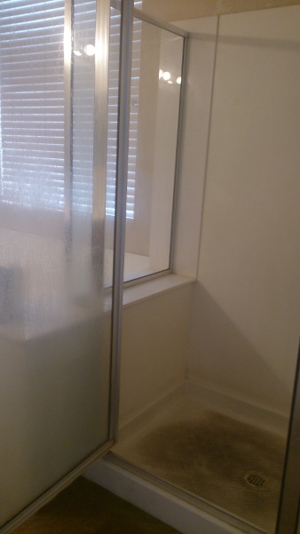 Dirty shower before professional bathroom deep cleaning
